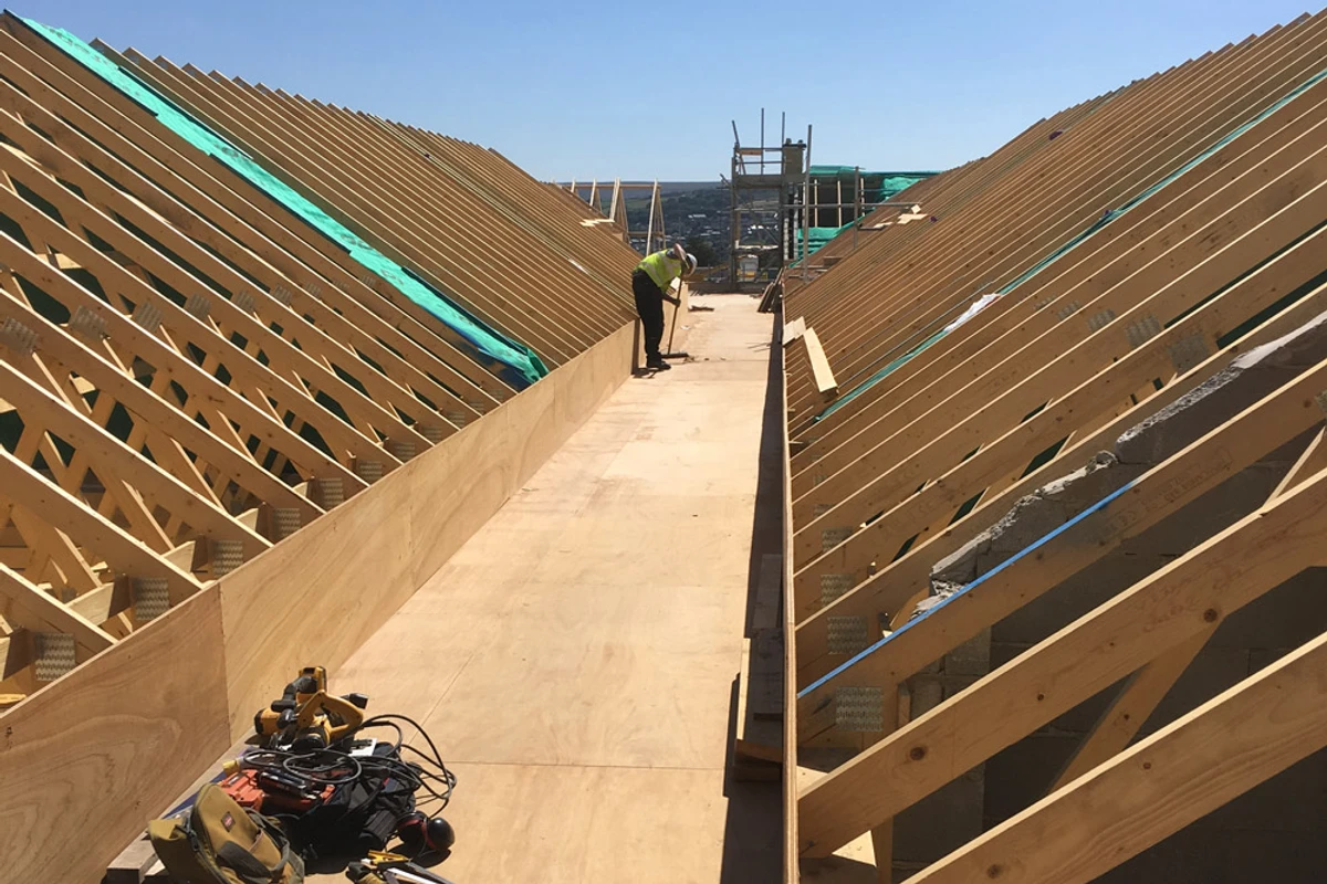 Internal view of roof trusses in place on new build 