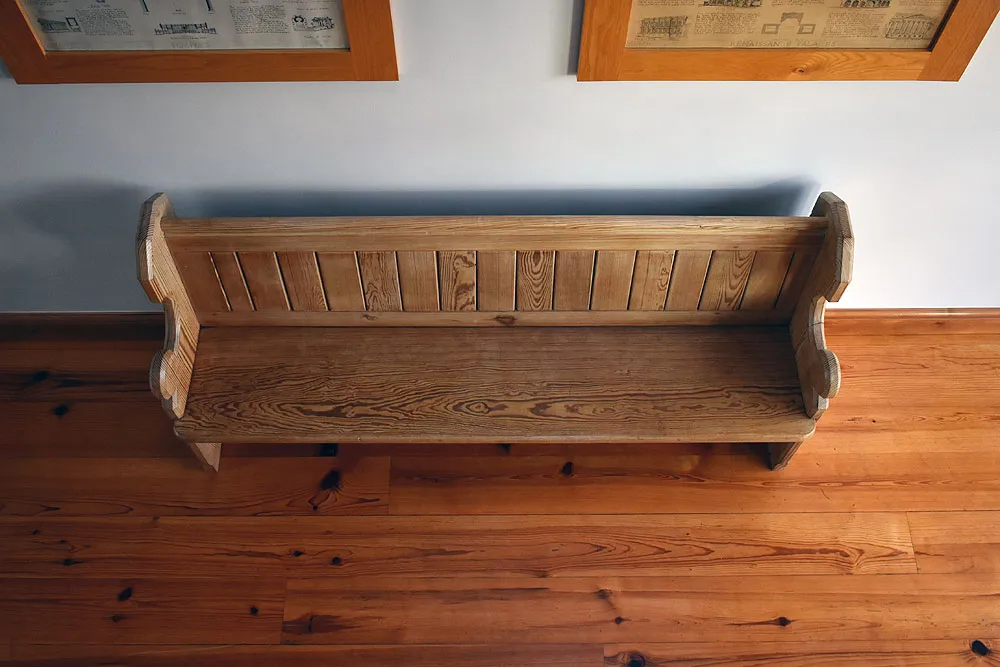 Refinished church pew in restoration project in Tadcaster 