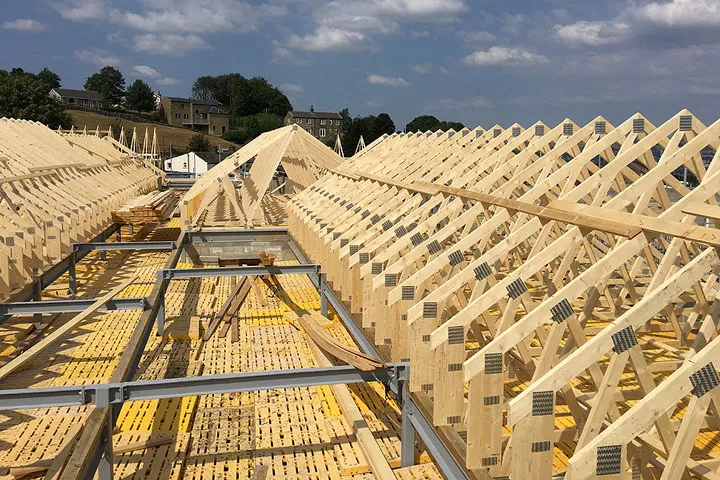 Commercial roof trusses installed with crane assistance  in Boston-spa
