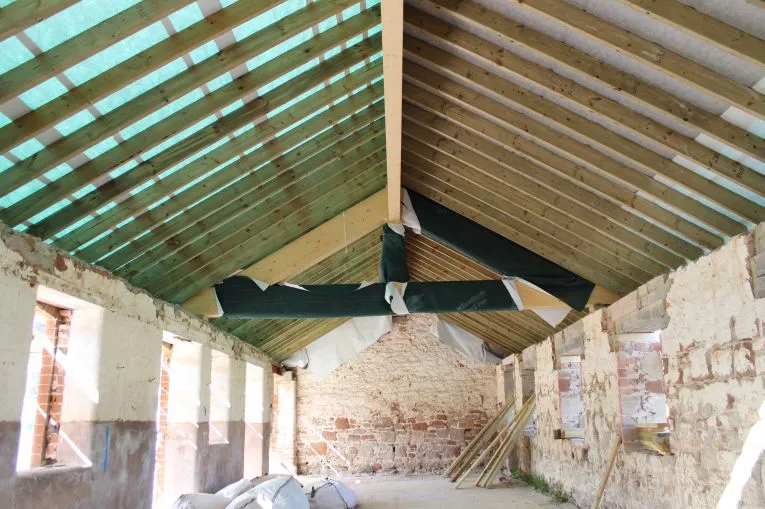 Close-up view of precise joinery in traditional roof construction 