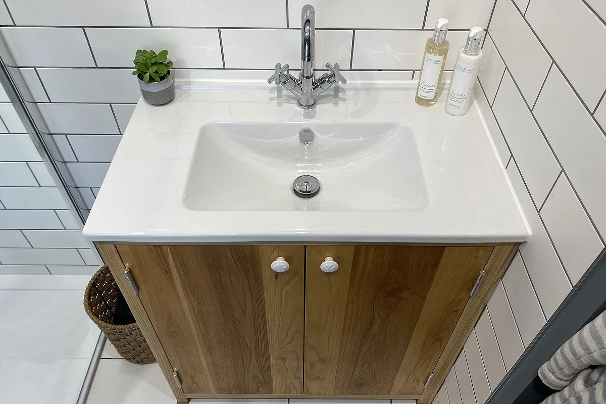 Bespoke ash bathroom vanity cabinet with traditional joinery detailing Rothwell